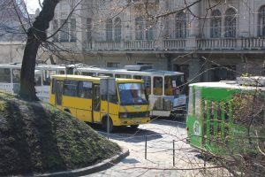 Some of Lviv’s public transport: a marshrutka and two trams.
