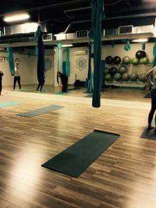 Inside Fitology’s aerial yoga class.