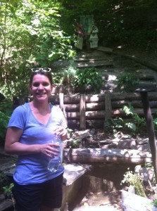 The author collecting cool, refreshing holy water on a hot Ukrainian day!