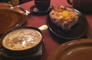 Сациви «Традиционный» (Traditional Satsivi) and Хачапури аджарская лодочка (Adjarian Boat Khachapuri)