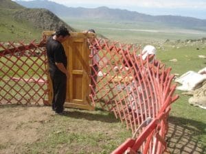 3. A small door, "eshik" in Kyrgyz, completes the yurt base structure.